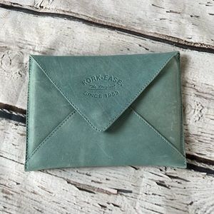 Kork-Ease blue leather single pocket envelope clutch.